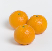 Three oranges on a white backgroundHealth Healthy Eating Nutrition Orange Citrus Citric Acid Cutout3 Health Healthy Eating Nutrition Orange Citrus Citric Acid Cutout3