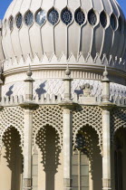 The onion shaped dome of the 19th Century Pavilion designed in the Indo- Saracenic style by John Nash commissioned by George Prince of Wales later to become King George IV. The crest of the Prince of...