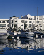 View across the marina towards white apartment buildings.African Flat Middle East North Africa Northern