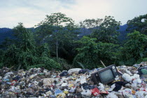 Rubbish dump in rainforest .tip pollution environmental Caribbean Ecology Entorno Environnement Green Issues Scenic Trini Trinidadian West Indies