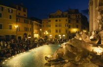 Trevi Fountain at night with people sitting around the fountain Italia Italian Nite Roma Southern Europe European