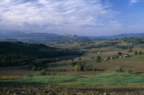 View across fields and hillside towards the hilltown of Todi.Italia Italian Southern Europe European Farming Agraian Agricultural Growing Husbandry  Land Producing Raising Scenic