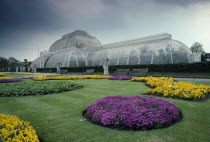 Kew Gardens hot house with flower beds in the foreground.European Great Britain Londres Northern Europe UK United Kingdom