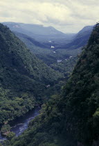 River valley with tropical forest covering steep sides American Guayanian South America Southern National Park