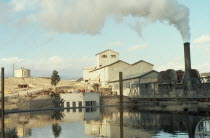 Phosphates refinery near Metlaoui with plume of smoke rising from chimney at side.air pollution African Ecology Entorno Environmental Environnement Green Issues Middle East North Africa Gray Northern