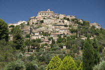 Gordes.  View of hilltop village from the road below with church at summit.European French Western Europe Scenic