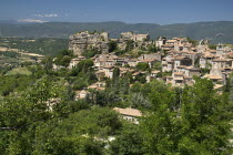 Saignon.  Provencal hilltop village with Mont Ventoux seen in the distance  top left.European French Western Europe Scenic