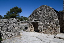 Le Village des Bories.  Primitive village comprising of mortarless  stone bories  beehive shaped huts each with a specific agricultural or dwelling purpose.  A reconstructed house dating from the 17t...