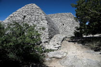 Le Village des Bories.  Primitive mortarless stone built  beehive shaped hut in ancient village originally used as  barn.  European French Western Europe Agriculture Farm Farming Agraian Agricultural...