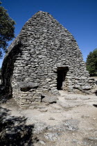 Le Village des Bories.  Ancient village comprising of mortarless stone  beehive shaped huts or bories  each with a specific function such as the barn pictured.The village was restored in 1976Europea...