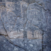 Rock drawings depicting hunting or battle scene.History Middle East Omani
