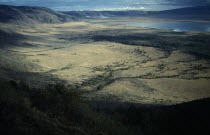 View from the rim of volcanic crater across valley floor and Lake Magadi.African Eastern Africa Scenic Tanzanian