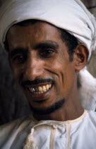 Portrait of man wearing white turban smiling Happy Male Man Guy Male Men Guy Middle East Omani One individual Solo Lone Solitary 1 Contented Single unitary
