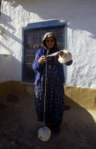 Elderly woman spinning a ball of woolEuropean Female Women Girl Lady Middle East Old Senior Aged One individual Solo Lone Solitary Turkish Turkiye Western Asia
