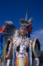Blood Tribe member in traditional dress at a Pow WowAmerican Canadian Classic Classical Historical North America Northern Older One individual Solo Lone Solitary 1 History Single unitary