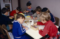 Sunday School pupils making greetings cards for Jewish New Year. multi-cultural culture society European Great Britain Kids Learning Lessons Londres Northern Europe Religion Religion Religious Judais...