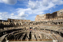 The interior of the Colosseum with viewing touristsEuropean Italia Italian Roma Southern Europe History Holidaymakers Tourism