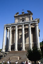 Tourists in the Forum walking past the portico of the Temple of Antoninus and Faustina incorporated into the church of Sant Lorenzo in MirandaEuropean Italia Italian Roma Southern Europe History Holi...