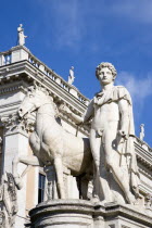 One of the statues of the Dioscuri Castor and Pollux at the top of the Cordonata on the Capitol in front of Palazzo NuovoEuropean Italia Italian Roma Southern Europe 1 Gray History Religion Single un...