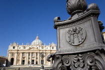 Vatican City The Basilica of St Peter and a detail of a lamppost in the square with the Papal Keys on itEuropean Italia Italian Roma Southern Europe Catholic Principality Citta del Vaticano Religion...