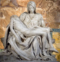 Vatican City The 1499 Renaissance Pieta by Michelangelo in St Peters Basilica depicting the body of Jesus in the arms of his mother Mary after the crucifixionEuropean Italia Italian Roma Southern Eur...
