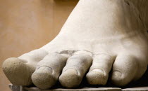 The courtyard of the Palazzo dei Conservatori part of the Capitoline Museum with a marble foot from one of the many colossal statues of ancient RomeEuropean Italia Italian Roma Southern Europe 1 Hist...
