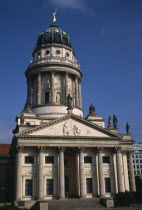 Franzosischer Dom in the Gendarmenmarkt  built by the Huguenot community 1701-1705.  Exterior with steps to entrance  and domed roof with statues. French CathedralCalvinistEighteenth Century 18th c...