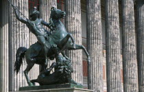 Bronze equestrian statue entitled The Lion Fighter by Albert Wolf in 1847 outside colonnaded facade of the Altes Museum designed by Karl Friedrich Schinkel.Neo-classicalRauch SchoolOld Museum Deuts...