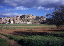 El Pinell de Brai. Hilltop village seen from a field below.European Scenic Southern Europe  Espainia Espana Espanha Espanya Hispanic Spanish Catalunya Catalonia