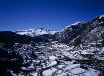 Elevated view south west along Rio Esera with snow covered valley and mountains. The town of Benasque seen on the lower right corner.European Scenic Southern Europe  Espainia Espana Espanha Espanya H...