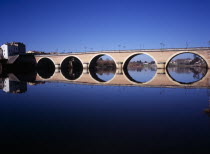 Bergerac. Old bridge over River Dordogne with its reflection on the water.European Scenic French Western Europe Reflexion