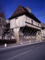 House View Moulin balanced on top of remains of town hall circa 17th Century.European Scenic French Western Europe