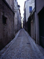 Medieval quarter. Rue Port de Graule which has been restored with cobbled street.European Scenic French Western Europe