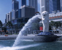 Merlion statue in Merlion Park with HSBC bank   The Fullerton Hotel and other city skyscrapers behindAsian Singaporean Singapura Southeast Asia Xinjiapo