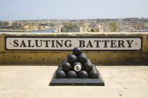 Cannonballs  Saluting Battery sign  Saluting Battery  Upper Barracca Gardens  and Grand Harbour TravelTourismHolidayVacationExploreRecreationLeisureSightseeingTouristAttractionTourDestinat...