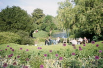 Opera attendees enjoying picnics in the gardens during interval.Near LewesEuropean Great Britain Northern Europe Performance UK United Kingdom British Isles Public Presentation