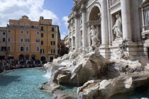 The 1762 Trevi Fountain by Nicola Salvi with tourists in the Piazza Di TreviEuropean Italia Italian Roma Southern Europe History Holidaymakers Tourism