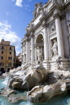 The 1762 Trevi Fountain by Nicola Salvi with tourists in the Piazza Di TreviEuropean Italia Italian Roma Southern Europe History Holidaymakers Tourism