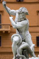 Piazza Navona The Fontana di Nettuno or Fountain of Neptune with the central figure of the sea god Neptune fighting an octopusEuropean Italia Italian Roma Southern Europe History Religion