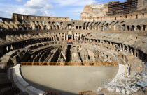 The Colosseum amphitheatre interior with tourists built by Emperor Vespasian in AD 80 in the grounds of Domus Aurea the home of Emperor Nero showing the restored sections in the foregroundEuropean It...
