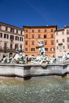 Piazza Navona The Fontana di Nettuno or Fountain of Neptune with the central figure of the sea god Neptune fighting an octopusEuropean Italia Italian Roma Southern Europe History Holidaymakers Religi...