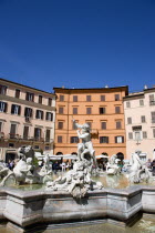 Piazza Navona The Fontana di Nettuno or Fountain of Neptune with the central figure of the sea god Neptune fighting an octopusEuropean Italia Italian Roma Southern Europe History Holidaymakers Religi...