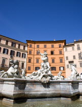 Piazza Navona The Fontana di Nettuno or Fountain of Neptune with the central figure of the sea god Neptune fighting an octopusEuropean Italia Italian Roma Southern Europe History Holidaymakers Religi...