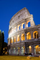 The Colosseum amphitheatre exterior illuminated at night built by Emperor Vespasian in AD 80 in the grounds of Domus Aurea the home of Emperor NeroEuropean Italia Italian Roma Southern Europe History...