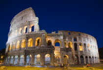 The Colosseum amphitheatre exterior illuminated at night built by Emperor Vespasian in AD 80 in the grounds of Domus Aurea the home of Emperor NeroEuropean Italia Italian Roma Southern Europe History...