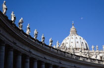 Vatican City The Basilica of St Peter with the sweeping colonnade by Bernini topped with statuesEuropean Italia Italian Roma Southern Europe Catholic Principality Citta del Vaticano History Papal Rel...