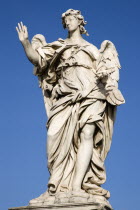 Statue of a winged female angel on the Ponte Sant Angelo bridge over the River TiberEuropean Italia Italian Roma Southern Europe History Religion Religious