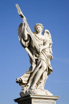 Statue of a winged female angel holding a cross on the Ponte Sant Angelo bridge over the River TiberEuropean Italia Italian Roma Southern Europe History Religion Religious