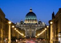 Vatican City The Basilica of St Peter and the Via della Conciliazione busy with traffic illuminated at nightEuropean Italia Italian Roma Southern Europe Catholic Principality Citta del Vaticano Histo...