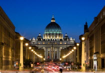 Vatican City The Basilica of St Peter and the Via della Conciliazione busy with traffic illuminated at nightEuropean Italia Italian Roma Southern Europe Catholic Principality Citta del Vaticano Histo...